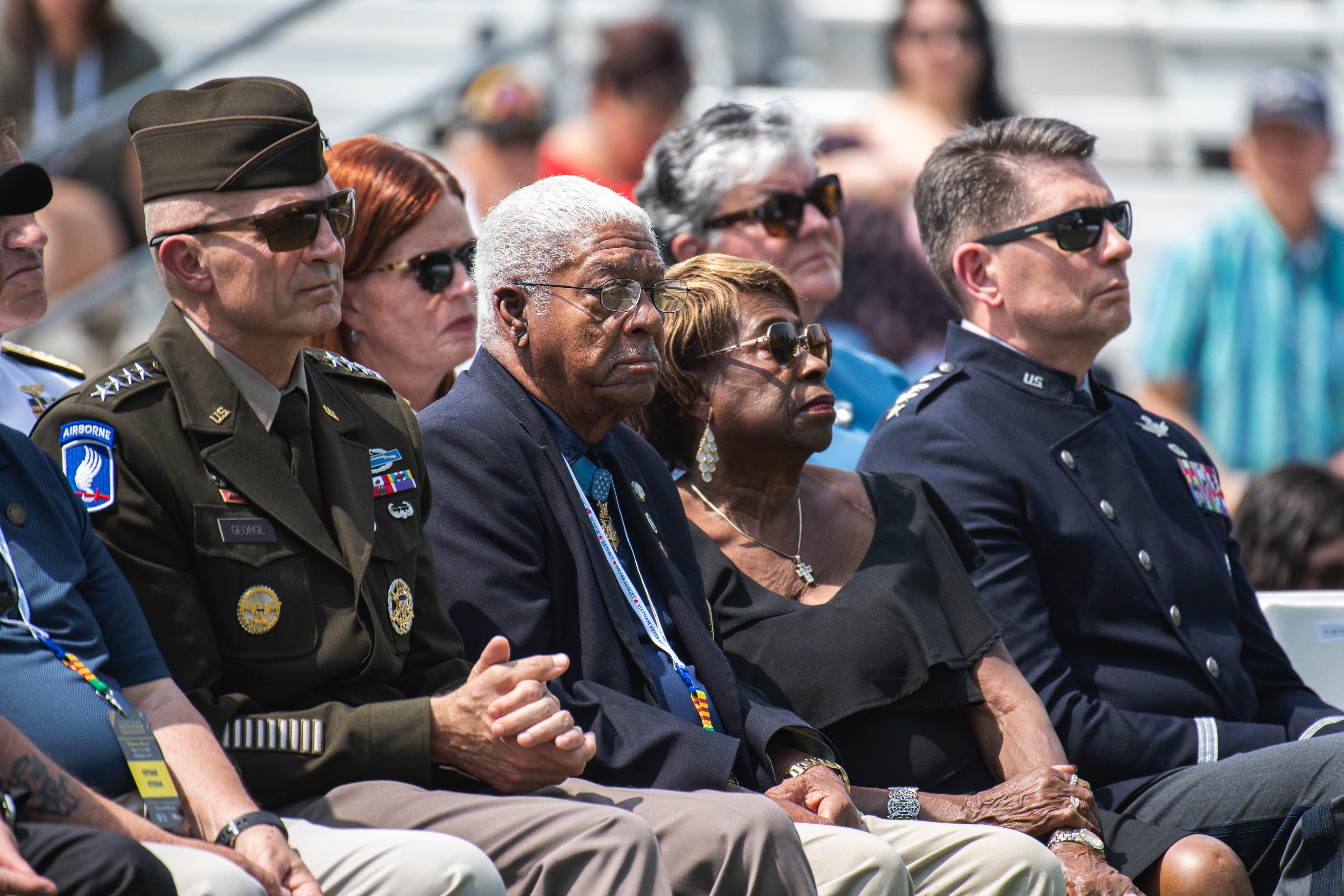 Medal of Honor recipient Melvin Morris listens during the opening ceremony for the Vietnam Veterans “Welcome Home” Celebration at the west end of JFK Hockey Fields on the National Mall in Washington, D.C.