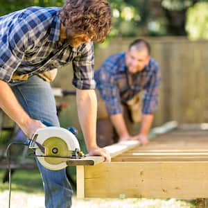 carpenter using a saw