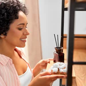 woman holding aromatherapy tray 