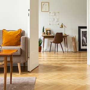 living room and office space with parquet flooring