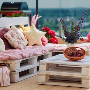 A bench and a coffee table both made from pallets