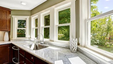 kitchen with double pane windows over sink