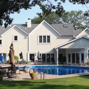 Pool in the backyard of large house