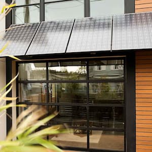 Patio awning with solar panels