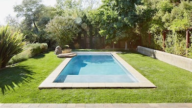 Small pool in backyard of home