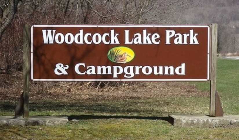 The welcome sign at Woodcock Creek Lake Park and Campground.