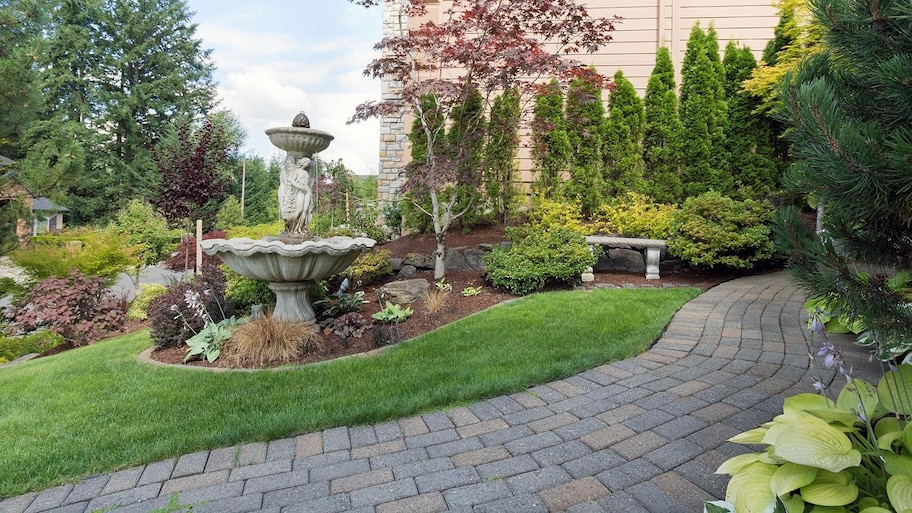 A house’s beautiful walkway with brick pavers laid