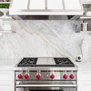 white marble kitchen with gas stove range