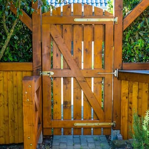 A wooden gate with a latch