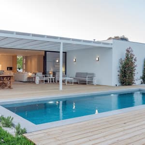 A modern villa with pool and garden