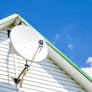 A satellite dish on a house