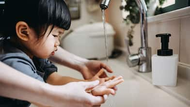 Child washing hands