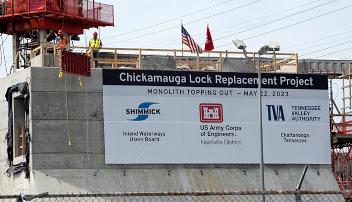 Shimmick Crane Operator Patrick Harrison lifted the last concrete form from monolith L13 to mark the official completion of the first of 36 monoliths. The U.S. Army Corps of Engineers Nashville District and its contractor, Shimmick, held a topping-off ceremony May 22, 2023, at the Chickamauga Lock Replacement Project on the Tennessee River in Chattanooga, Tennessee. (USACE Photo by Lee Roberts)