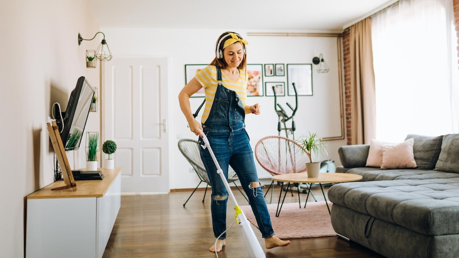 A woman cleaning her house