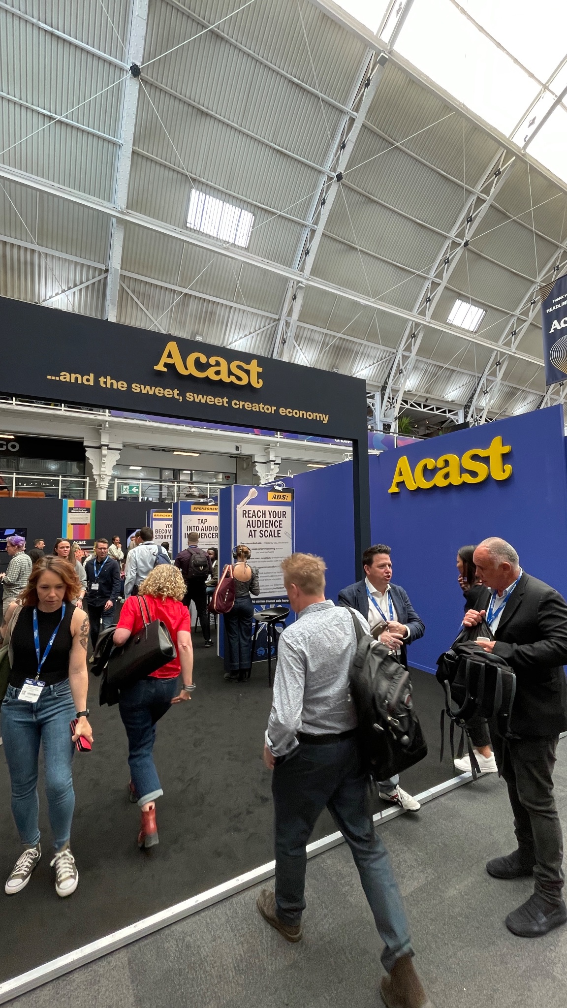 A picture of Acast’s stand at Podcast Show London