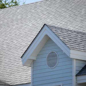 close up of a house roof with shingles