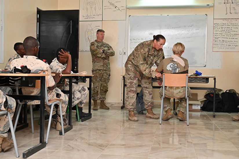 Service members in a classroom.