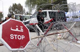 Tunisian police guard the site of a terrorist attack - soucre: Reuters