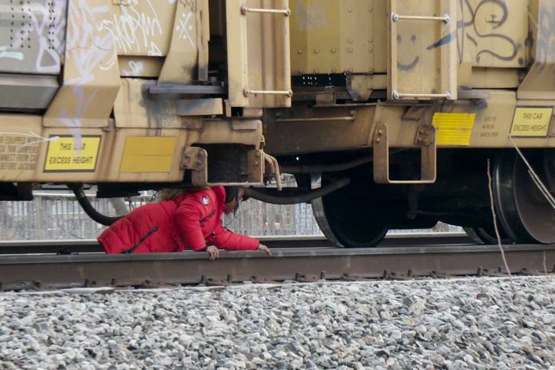 As rail profits soar, blocked crossings force kids to crawl under trains to get to school