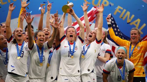 LYON, FRANCE - JULY 07: Megan Rapinoe of the USA lifts the trophy as USA celebrate victory during the 2019 FIFA Women's World Cup France Final match between The United State of America and The Netherlands at Stade de Lyon on July 07, 2019 in Lyon, France. (Photo by Richard Heathcote/Getty Images)