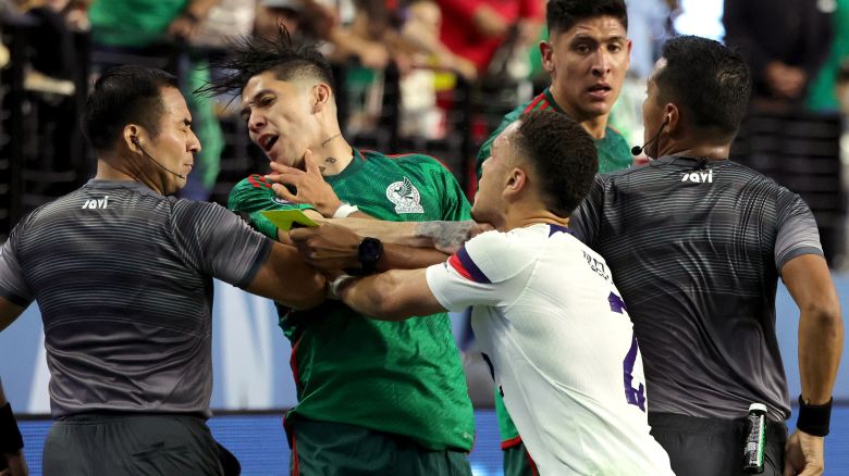 Gerardo Arteaga #6 of Mexico and Sergiño Dest #2 of the United States push each other during the 2023 CONCACAF Nations League Semifinal at Allegiant Stadium on June 15, 2023 in Las Vegas, Nevada.