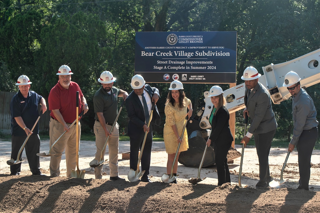 U.S. Army Corps of Engineers, Galveston District representatives, including Byron Williams, Deputy District Engineer, second from right, David Mackintosh, Chief - Houston Project Office, right, and community partners break ground at the groundbreaking ceremony for a Harris County-led drainage improvement project in Bear Creek Village, Houston TX, June 9, 2023.