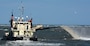 The shallowdraft, sidecast vessel MERRITT dredges the federal channel at Oregon Inlet.