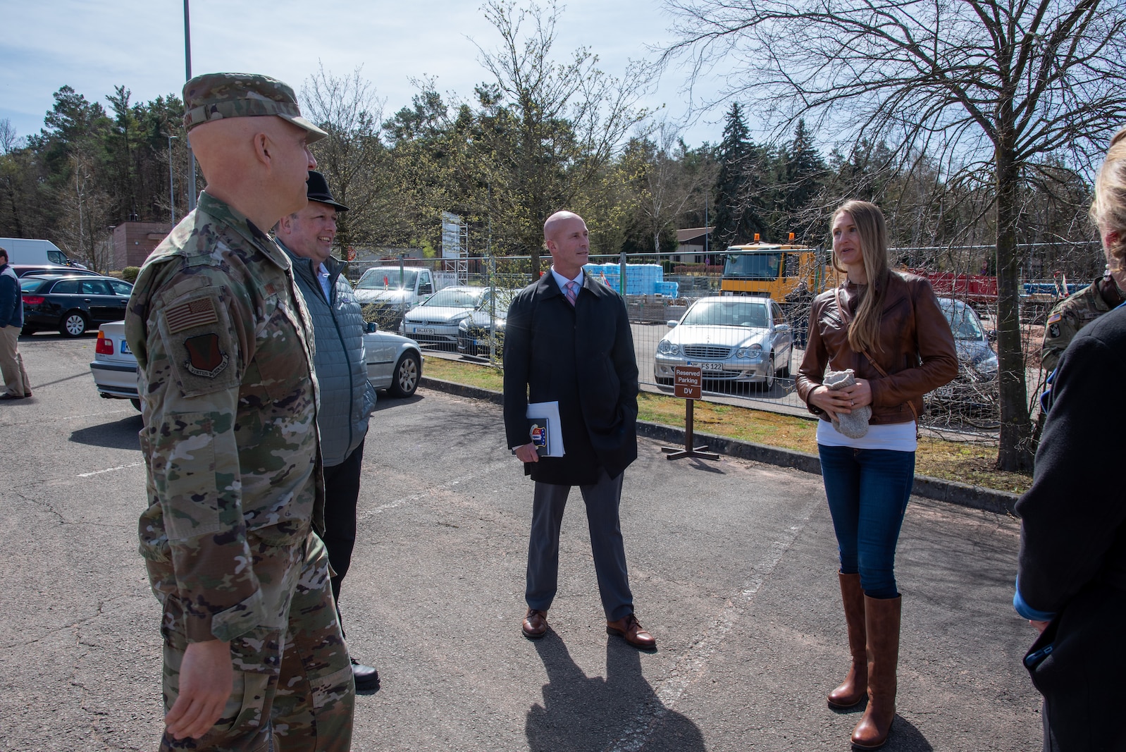 U.S. Army Corps of Engineers, Europe District Regional Program Manager for Air Force Military Design and Construction Program Jennifer Regel, right, discusses the construction of the new Family Housing Management Facility in Vogelweh, Germany April 11, 2022 with project partners, including the then 86th Air Lift Wing Commander U.S. Air Force Brig. Gen. Joshua Olson, left, just before its formal groundbreaking ceremony. The project is an example of one of the many traditional military construction projects Europe District delivers in support of U.S. Air Forces Europe at installations across the continent. (U.S. Army photo by Alfredo Barraza)