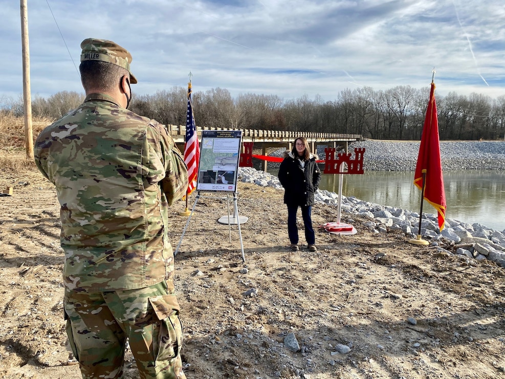 IN THE PHOTO, Memphis District Commander Col. Zachary Miller and other district leadership are briefed on the details of the St. Francis bridge (CR736) project at the exact site where the construction took place. Afterward, the group held a ribbon-cutting ceremony, symbolizing the victory and celebration of completing yet another significant project. (USACE photo by Jessica Haas)