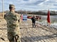 IN THE PHOTO, Memphis District Commander Col. Zachary Miller and other district leadership are briefed on the details of the St. Francis bridge (CR736) project at the exact site where the construction took place. Afterward, the group held a ribbon-cutting ceremony, symbolizing the victory and celebration of completing yet another significant project. (USACE photo by Jessica Haas)