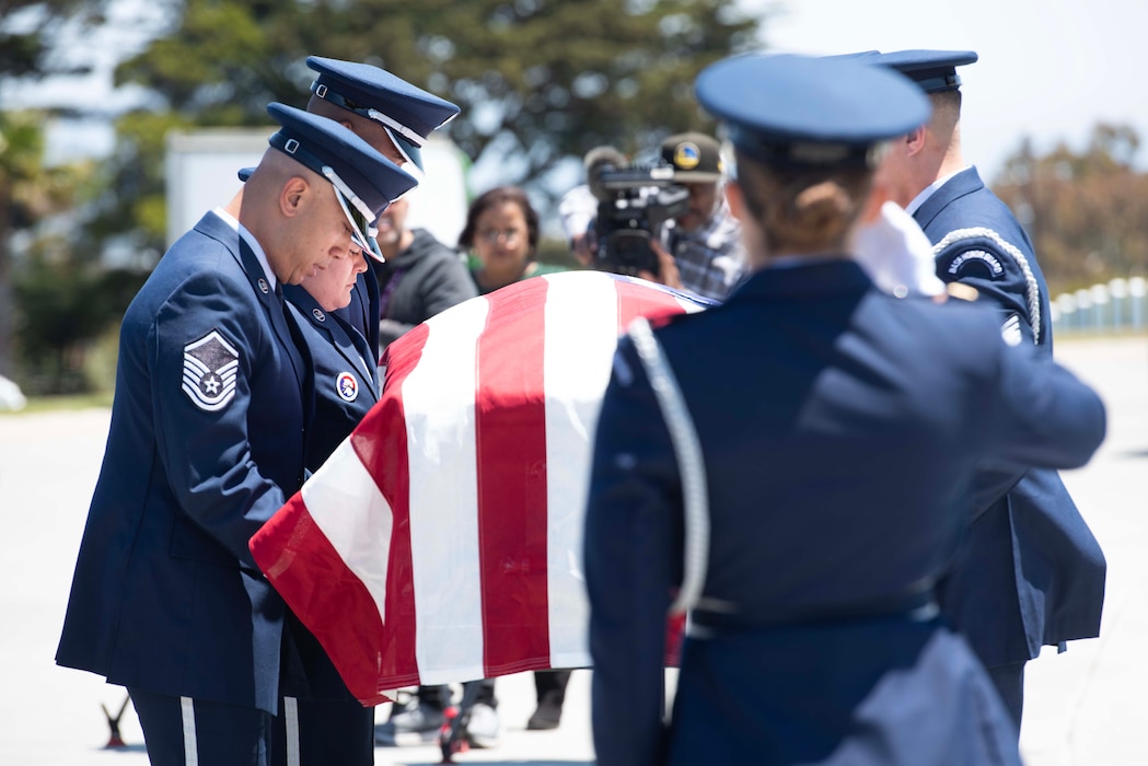 Airmen from the 60th Air Mobility Wing Honor Guard conduct a funeral