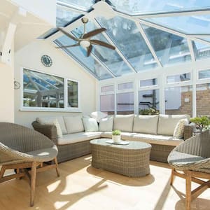 Interior of a home solarium with ceiling fan