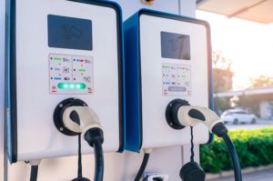 TWO EV CHARGING STATIONS SIT SIDE BY SIDE