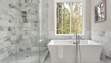 Modern bathroom with a tub and shower