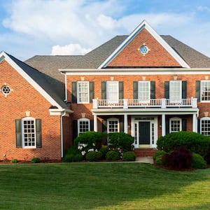 The exterior of a brick family house 