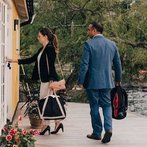 Couple arriving at a vacation home