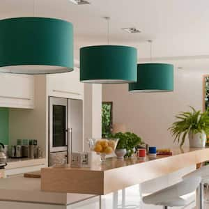 Kitchen with three green pendant lights