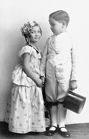 Alice and Heinrich Muller pose for a photograph while in costume for the Purim holiday. [LCID: 14849]