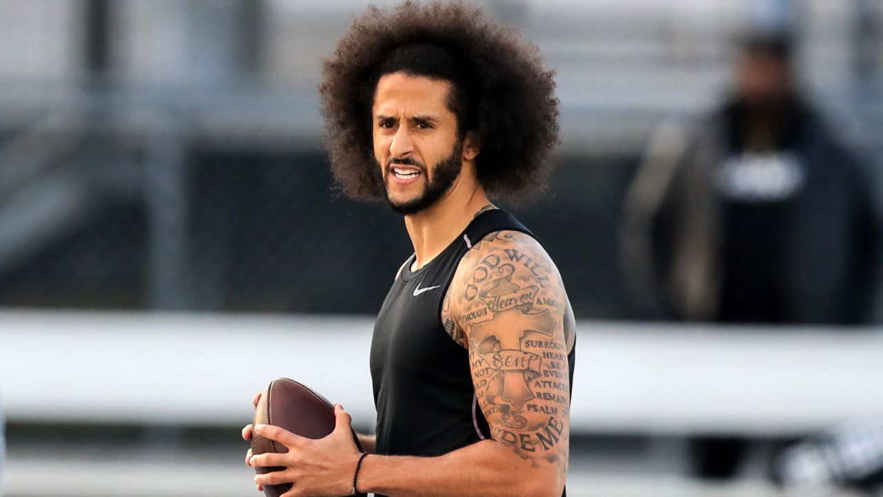 RIVERDALE, GA - NOVEMBER 16: Colin Kaepernick looks to make a pass during a private NFL workout held at Charles R Drew high school on November 16, 2019 in Riverdale, Georgia. Due to disagreements between Kaepernick and the NFL the location of the workout was abruptly changed.  (Photo by Carmen Mandato/Getty Images)