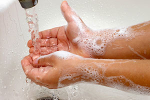 A child washing his hands