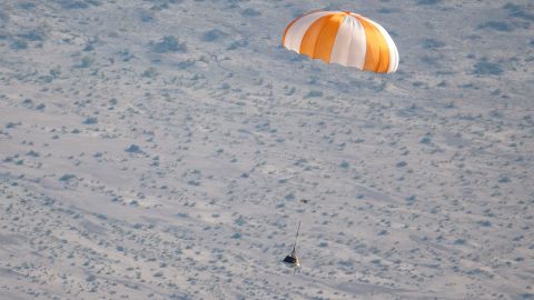 A training model of the sample return capsule is seen is seen during a drop test in preparation for the retrieval of the sample return capsule from NASA's OSIRIS-REx mission, Wednesday, Aug. 30, 2023, at the Department of Defense's Utah Test and Training Range. The sample was collected from asteroid Bennu in October 2020 by NASA's OSIRIS-REx spacecraft and will return to Earth on September 24th, landing under parachute at the Utah Test and Training Range. Photo Credit: (NASA/Keegan Barber)