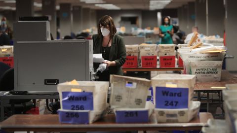 Claire Woodall-Vogg, executive director of the Milwaukee election commission collects the count from absentee ballots from a voting machine on November 4, 2020 in Milwaukee, Wisconsin. 