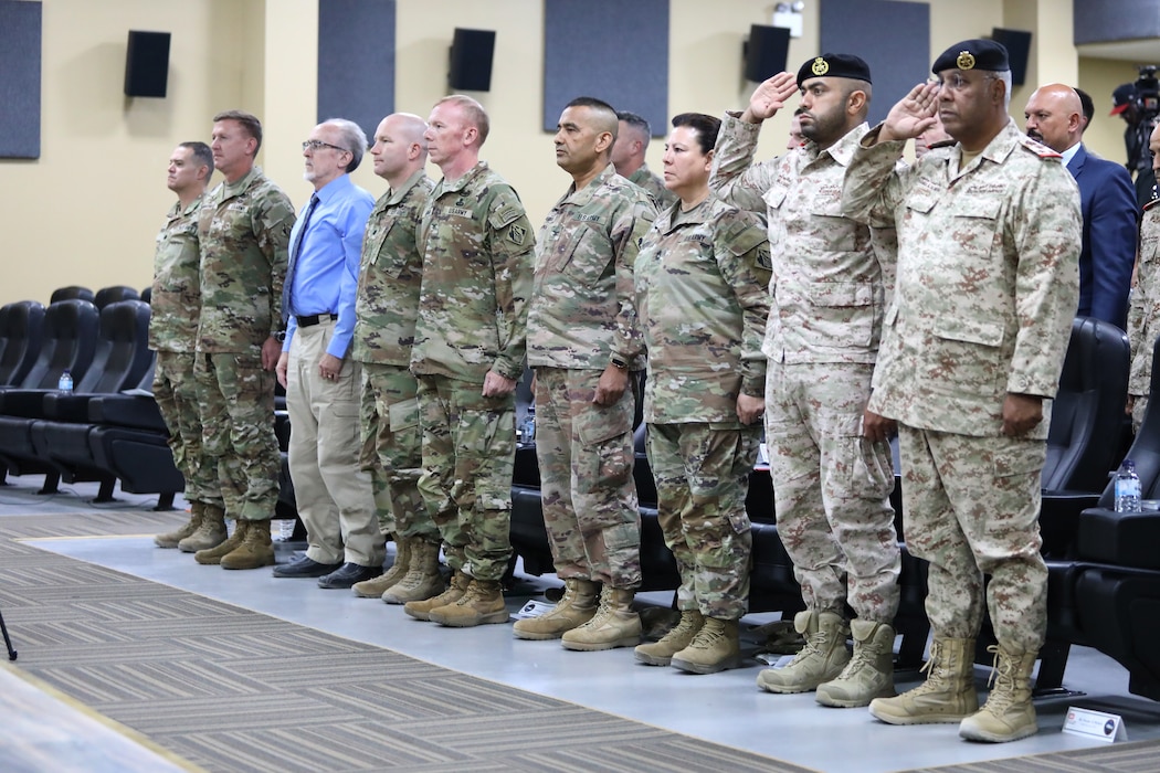 The U.S. Army Corps of Engineers only forward-deployed district welcomed its newest commander here July 6 as the district continues its pursuit of engineering excellence in the Central Command area of responsibility. The reins to the caravan, as the district is known colloquially, were passed to Col. Mohammed Rahman by outgoing district commander, Lt. Col. Richard Childers during a ceremony officiated by Transatlantic Division Commander Col. William Hannan and attended by local leadership, the district workforce and Kuwait Ministry of Defense partners.