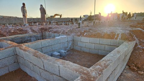 Graves are dug at the Tartoba cemetery outside Derna, Libya.