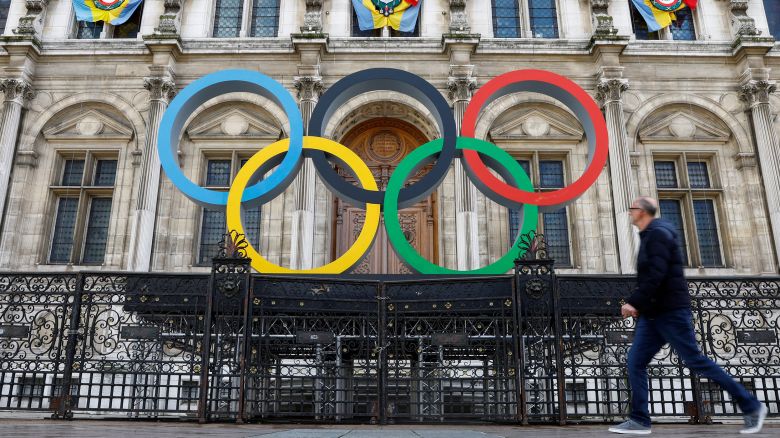 The Olympic rings are seen in front of the Hotel de Ville City Hall in Paris, France, March 14, 2023. REUTERS/Gonzalo Fuentes