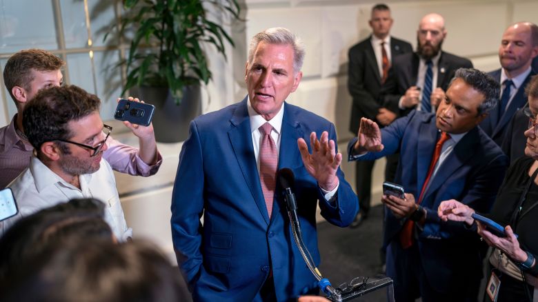 Speaker of the House Kevin McCarthy, R-Calif., talks to reporters about avoiding a government shutdown and launching an impeachment inquiry into President Joe Biden, following a closed-door meeting with fellow Republicans at the Capitol in Washington, Thursday, Sept. 14, 2023. (AP Photo/J. Scott Applewhite)