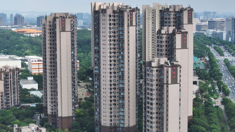The Evergrande logo is seen on residential buildings in Nanjing, in China's eastern Jiangsu province on August 18, 2023. Embattled Chinese property giant Evergrande Group filed for bankruptcy protection in the United States on August 17, 2023, court documents showed, a measure that protects its US assets while it efforts a restructuring deal. (Photo by STRINGER / AFP) / China OUT (Photo by STRINGER/AFP via Getty Images)