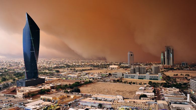 Sarah Hasan Al-Sayegh describes herself as the first female Kuwaiti-Arab storm chaser. Pictured here: A Haboob or dust wall looms dark and red over Kuwait City. 2011