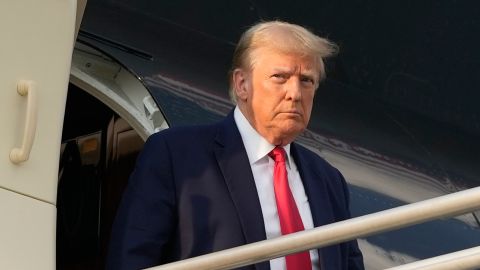 FILE - Former President Donald Trump steps off his plane as he arrives at Hartsfield-Jackson Atlanta International Airport, Thursday, Aug. 24, 2023, in Atlanta. (AP Photo/Alex Brandon, File)