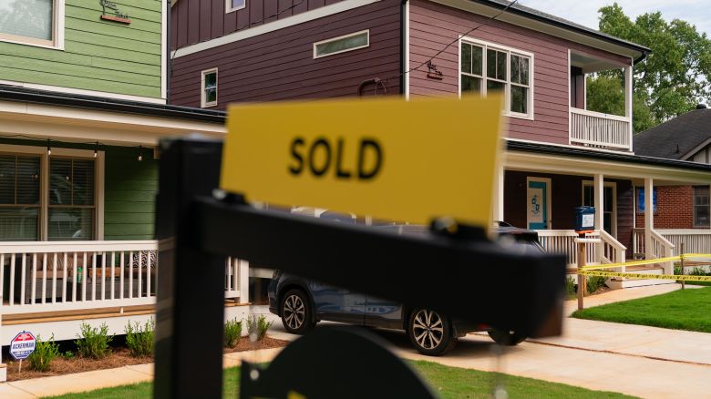 A sign outside a home for sale in Atlanta, Georgia, US, on Wednesday, Sept. 6, 2023. Home prices in the US climbed for a fifth month as buyers competed for deals in the least affordable market in decades. Photographer: Elijah Nouvelage/Bloomberg via Getty Images